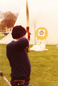 Rear view of woman standing against the sky