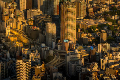 High angle view of modern buildings in city