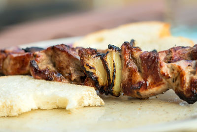 Close-up of meat on barbecue grill