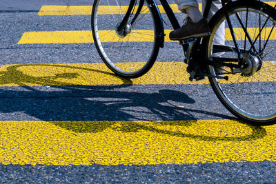 Low section of yellow bicycle