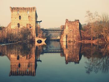 Reflection of buildings in lake