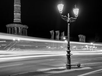 Low angle view of illuminated street at night