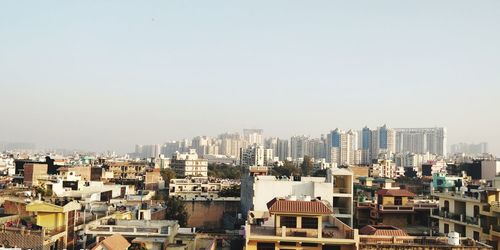 Cityscape against clear sky