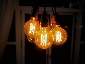 Close-up of illuminated light bulb