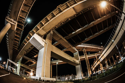 Low angle view of illuminated bridge