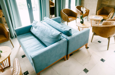 High angle view of chairs on table at home