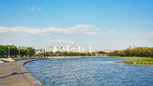 City by sea against sky