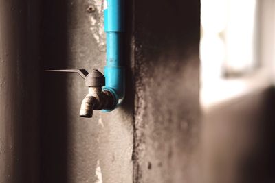 Close-up of pipe on wall