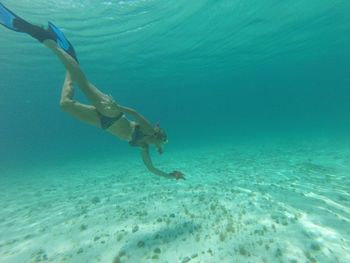 Woman snorkeling in sea