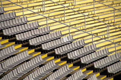 High angle view of empty chairs in stadium during corona