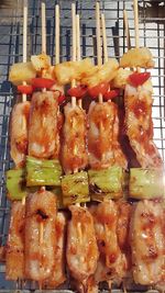 High angle view of food on barbecue grill