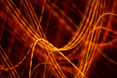 Abstract light background. yellow blured trail lights, strips and bokeh. beautiful motion painting