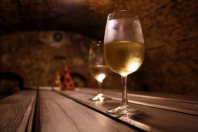 Wineglasses on table at restaurant