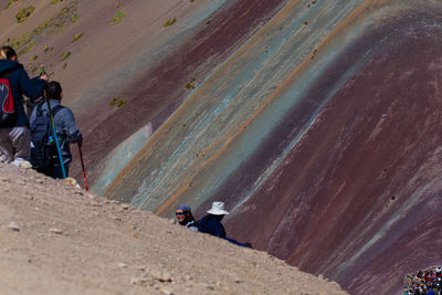 High angle view of people walking on road
