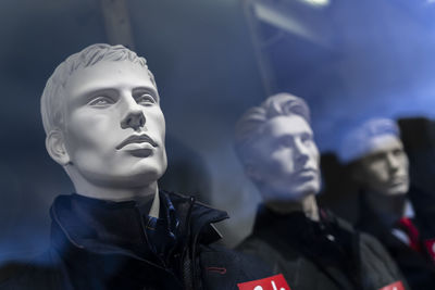 Close-up of statues in store