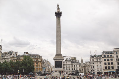 Low angle view of nelson column against sky