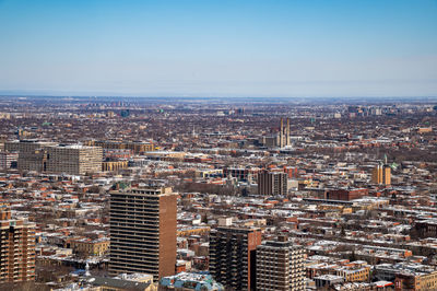 High angle view of buildings against sky in city