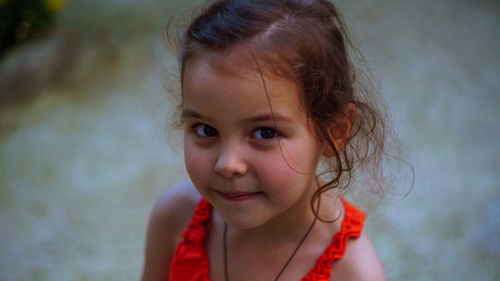 Close-up portrait of smiling girl