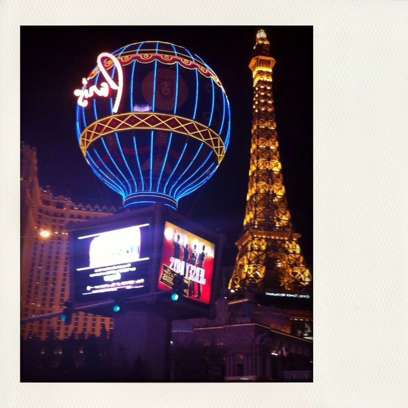 transfer print, architecture, built structure, low angle view, building exterior, illuminated, auto post production filter, night, sky, city, text, building, lighting equipment, outdoors, no people, communication, window, non-western script, famous place, city life