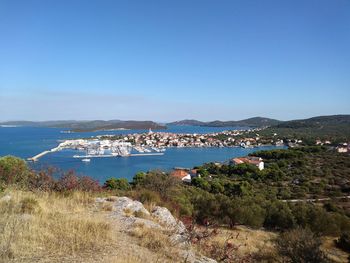 Scenic view of sea against clear blue sky