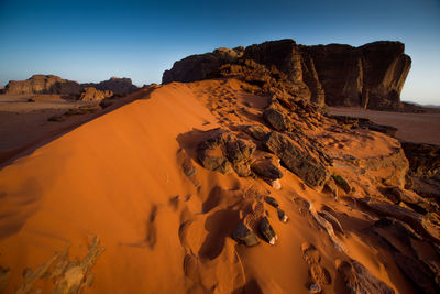 Rock formations in desert against sky