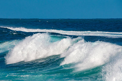 Seascape with massive wave with white foam nature background, texture