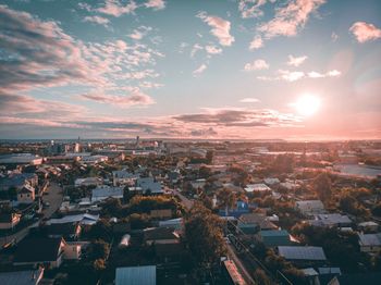 High angle view of townscape against sky during sunset