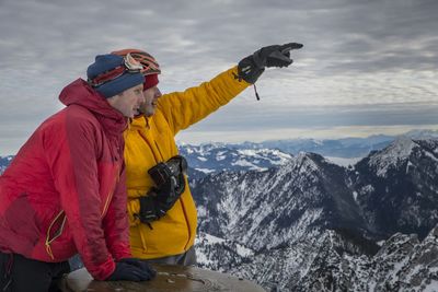 Tourists on mountain peak