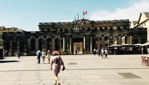 Tourists in front of historic building