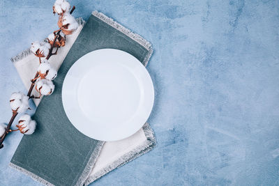 High angle view of coffee in plate on table