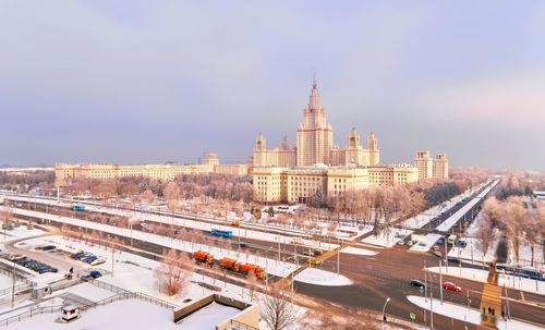 Overview from above the car and pedestrian crossing in winter sunny campus of moscow university