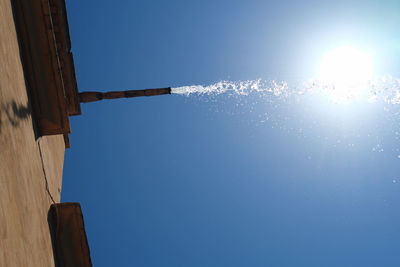 Low angle view of building against blue sky