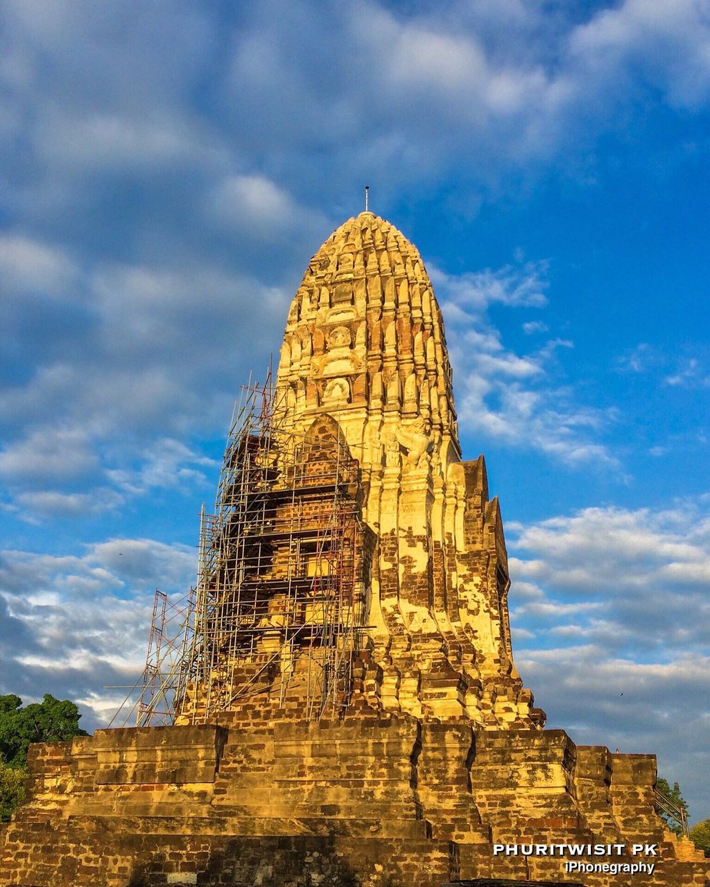 VIEW OF TEMPLE AGAINST CLOUDY SKY