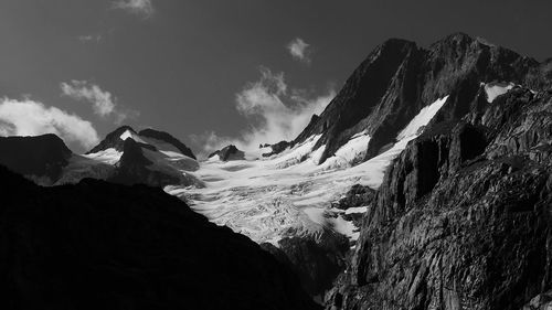 Panoramic view of mountains against sky during winter