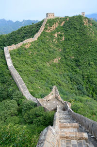 Old ruins on mountain against sky