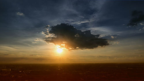 Scenic view of silhouette landscape against sky during sunset