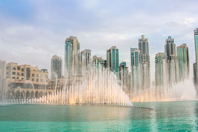 Panoramic shot of cityscape against sky