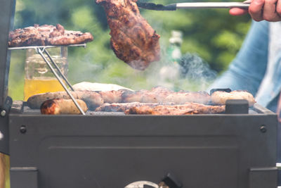 Close-up of meat on barbecue grill