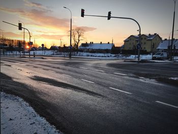 Road in city at sunset