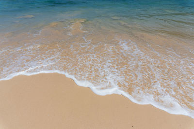 High angle view of surf on beach