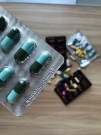 High angle view of bottles on table