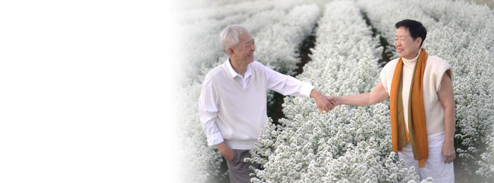 Side view of a friends standing outdoors