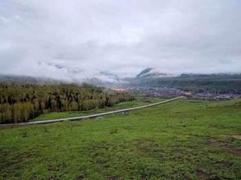 Scenic view of field against sky