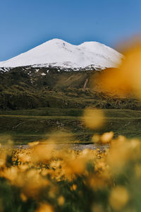 Scenic view of snowcapped mountain against sky