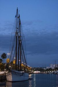 Boats moored at harbor