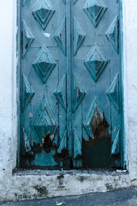 Close-up of blue window on wall