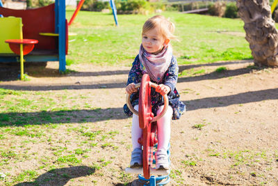 Girl wearing sunglasses in park