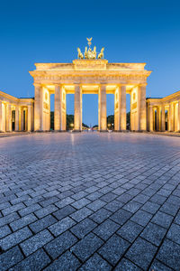 Low angle view of historical building at night