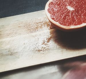 High angle view of fruits on cutting board