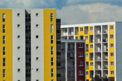 Yellow flat of blocks, residential area, modern neighborhood in brasov, romania